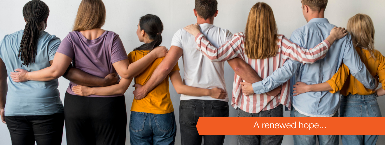 Group of people with their hands around each other