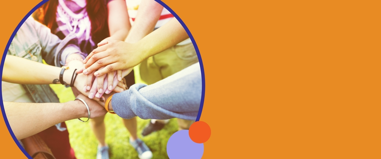 Hands in a circle together, over an orange background